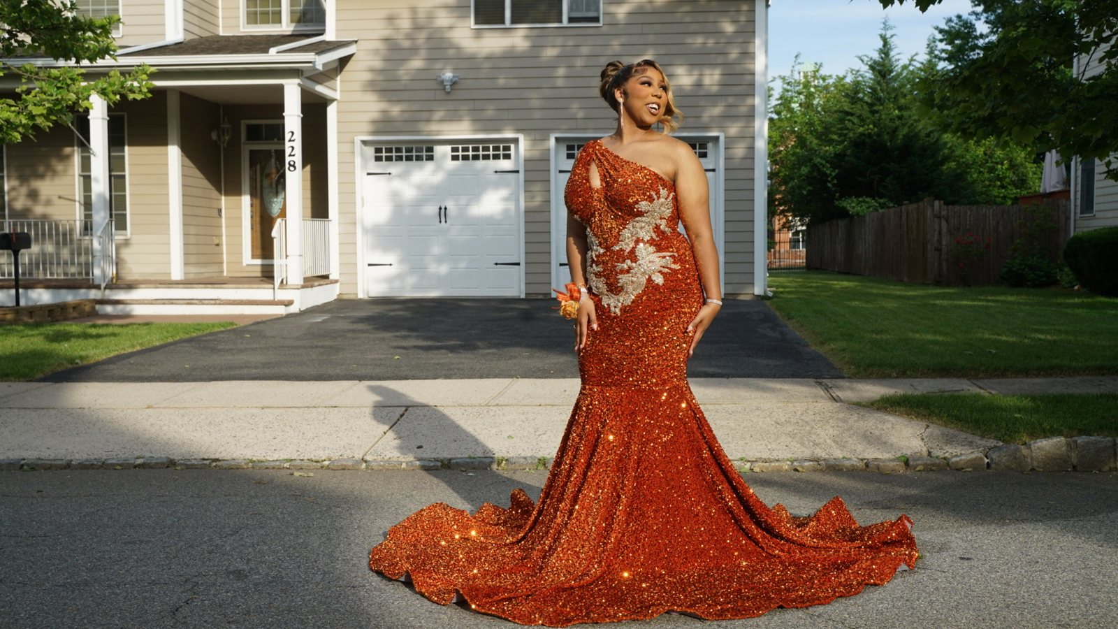 Mikaylah Ware in her orange formal gown